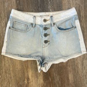 Two-toned high rise jean shorts.